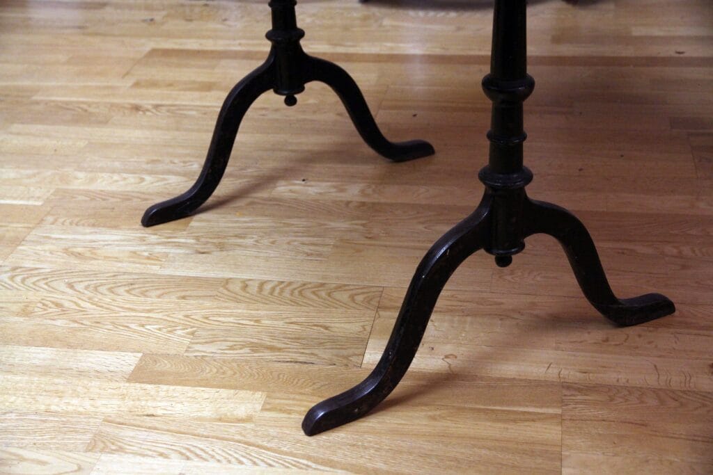 Wooden table with cast iron legs